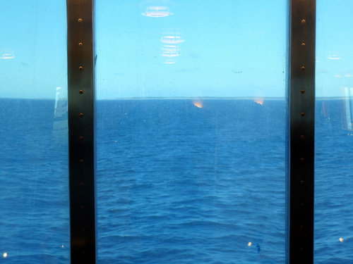 The port windows are convex, which distorts the view.